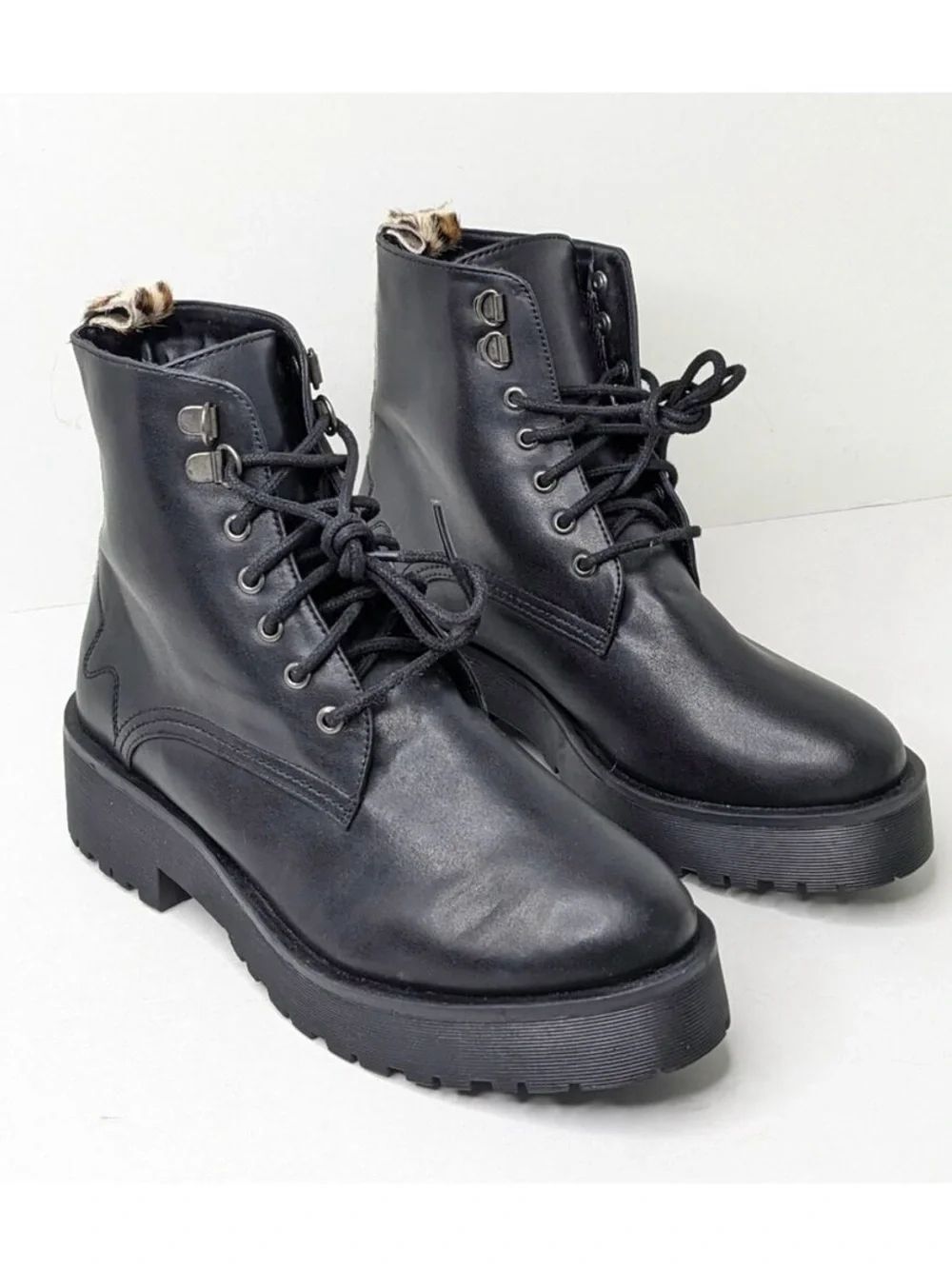 Secret Celebrity Black Faux Leather Leopard Calf Hair Lug Sole Combat Ankle Boot